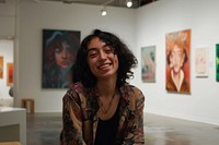 Multi ethnic art curator at gallery painting portrait smile.