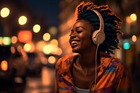 African woman headphones headset street.