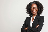 Good-looking middle-aged black businesswoman with arms crossed portrait glasses adult.