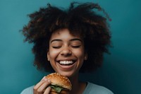 African American girl food laughing cheerful.