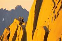 Person climbs up mountain recreation adventure. AI generated Image by rawpixel.