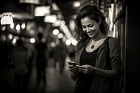 Smart phone portrait smiling texting.