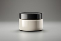 Glossy shoe polish cream jar packaging  gray gray background studio shot.