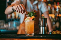 Bartender prepairing a cocktail at the bar bartender drink food.