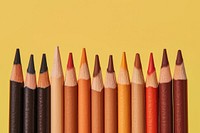 Diversity brown color shade of crayon backgrounds pencil arrangement.