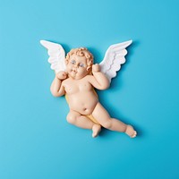 Baby cupid angel toy representation. AI generated Image by rawpixel.