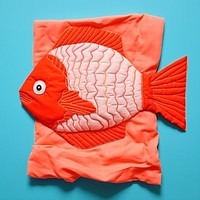 Simple fabric textile illustration minimal of a fish animal art representation.