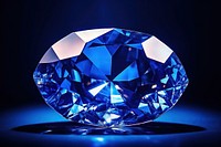 Blue gemstone jewelry diamond illuminated.