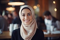 A happy Middle east woman coffee shop owner adult smile scarf.