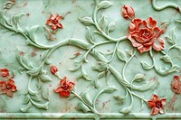 Tile of pastel green and red marble pattern plant rose.