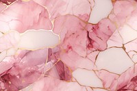 Tile of pink and gold marble backgrounds mineral accessories.