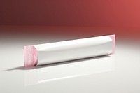 Effervescent tablet tube packaging  studio shot toothpaste lighting.