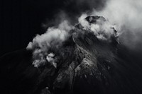 Dark background monochrome mountain volcano.