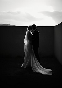 Wedding couple photography kissing bride.