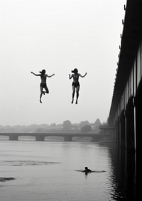 People jumping to the river silhouette outdoors motion.