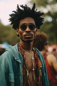 African man photography sunglasses necklace.