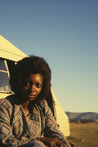 African woman travelling portrait outdoors nature.