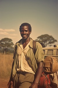 African man travelling portrait outdoors nature.