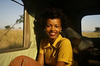 African woman travelling portrait outdoors camping.