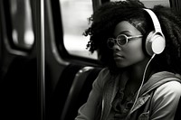 Woman wearing headphone headphones portrait glasses.