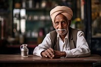 Elderly Indian Male adult male headwear.