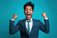 Happy young indian man shouting success adult.