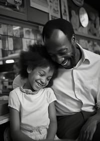 Black dad spend time with daughter portrait family child.
