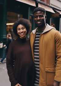 Black man holding hand pregnant woman street adult happy.