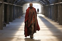 An african man model on fashion runway walking adult monk.