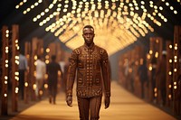 An african man model on fashion runway adult architecture illuminated.