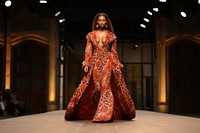 An african woman model on fashion runway dress adult gown.