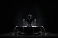 Dark background fountain monochrome black.