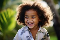 Samoan kid laughing child smile.