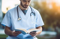 Medical student hospital reading adult.