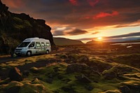 Sunset Scene of Moss cover on volcanic landscape with motor home camping van car of Iceland outdoors vacation vehicle.