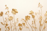 Real pressed gold flowers backgrounds pattern plant.