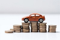 A saving money concept coin car investment.