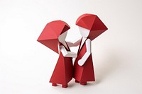 Couple hugging paper origami art.