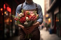 Man holding bouquet flower adult rose.