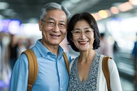 Asian couple at the airport glasses adult togetherness.