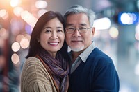 Asian couple at the airport portrait adult photo.