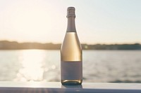 Bottle of champagne outdoors glass drink. AI generated Image by rawpixel.