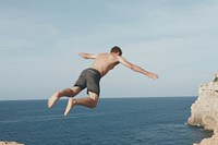 Sea cliff outdoors jumping. AI generated Image by rawpixel.
