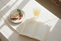 Breakfast book publication furniture. AI generated Image by rawpixel.
