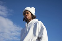 A black young man wearing white short matching flannel beanie sweatshirt adult blue.