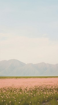  Mountains flower field landscape. AI generated Image by rawpixel.