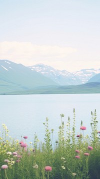  Mountains flower field lake. AI generated Image by rawpixel.