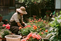 Florist doing gardening outdoors nature plant.