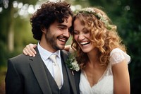 Bride and groom smiling laughing portrait wedding.