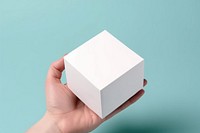 Gift box holding paper white.